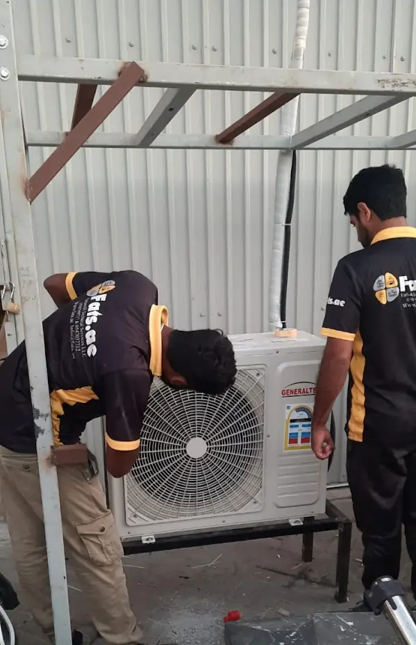fats team fixing ac